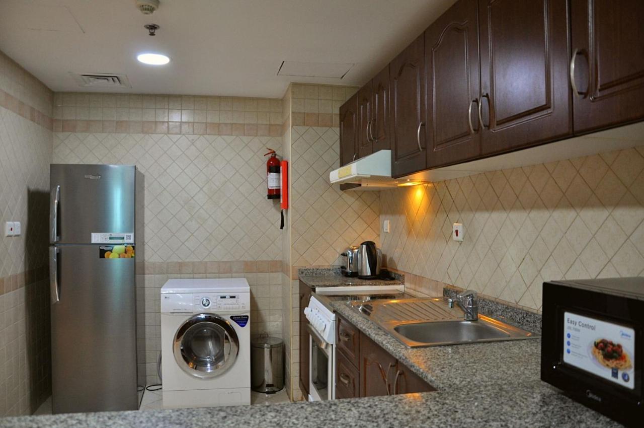 Care Holiday Homes Apartments Barsha Heights Dubái Exterior foto